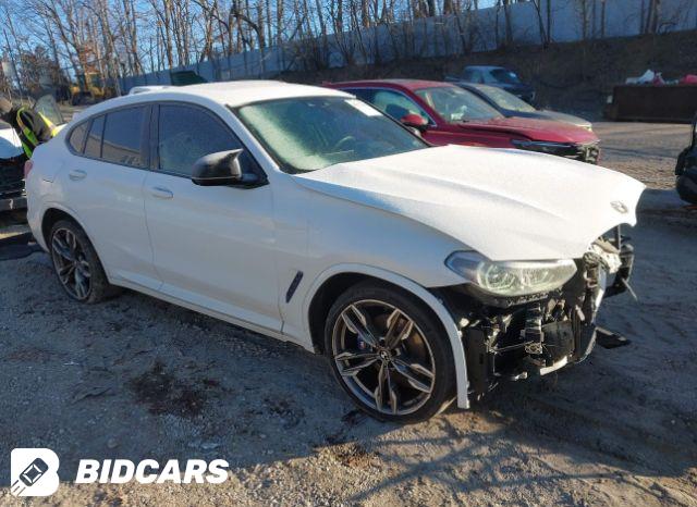BMW X4 2022, VIN 5UX43DT04N9K59023, 3/5