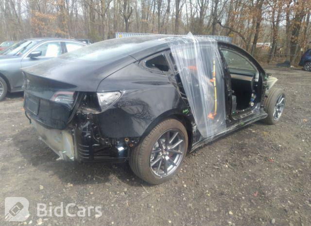 Tesla Model 3 2023, VIN 5YJ3E1EA1PF396022, 4/5
