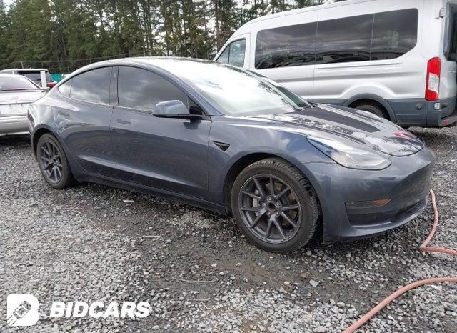 Tesla Model 3 2022, VIN 5YJ3E1EB9NF130642, 4/5