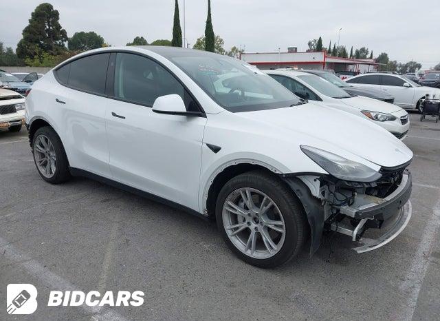 Tesla Model Y 2022, VIN 7SAYGAEE6NF522054, 1/5