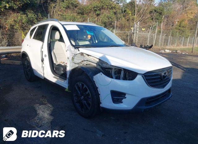 Mazda CX-5 2016, VIN JM3KE2CY7G0623916, 5/5
