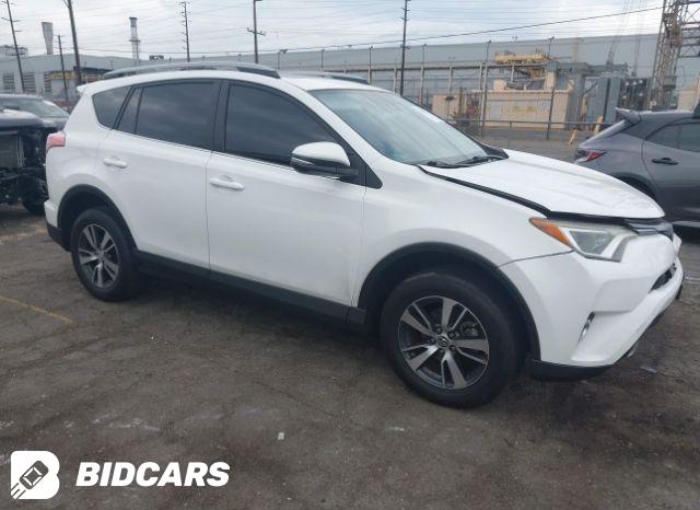 Toyota RAV4 2018, VIN JTMRJREV4JD184964, 6/11